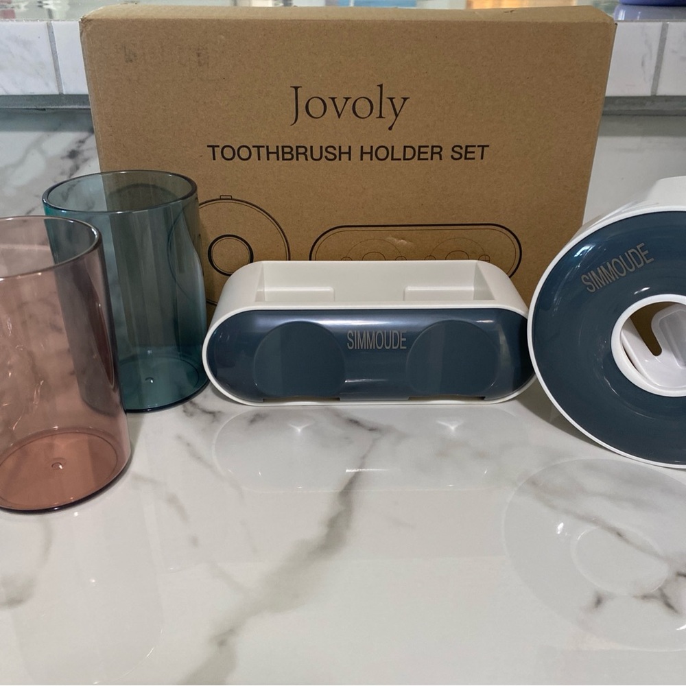 Wall mounted toothbrush holder and tooth paste dispenser with  mouthwash cups